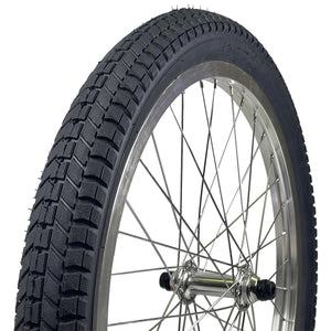 A black BMX tire with a wire bead and a tread pattern, mounted on a wheel.