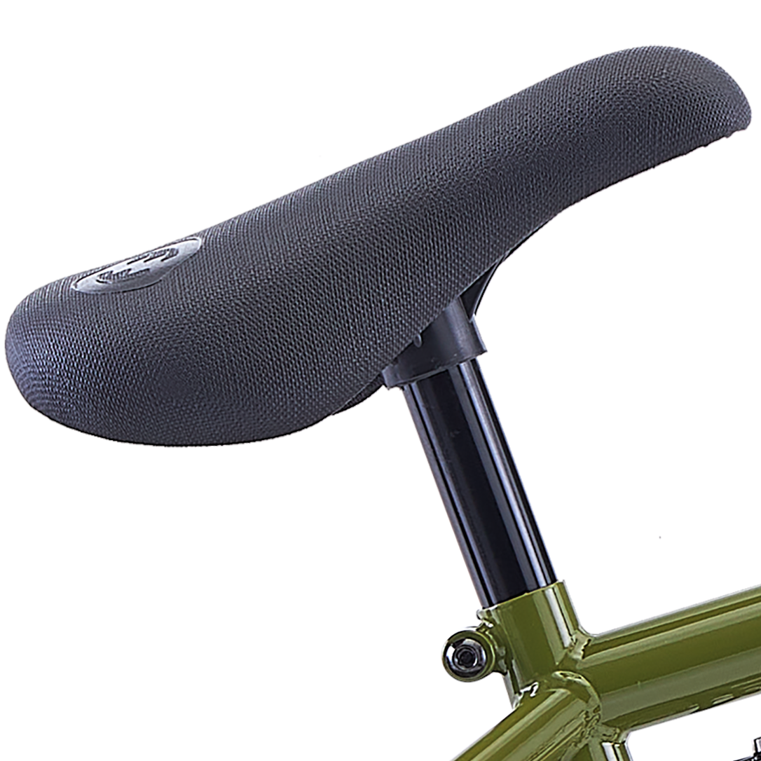 Close-up of a bicycle seat with a black textured saddle and black seat post, attached to an olive green frame against a white background.