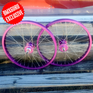 A pair of 20-inch purple Sealed High Flange Flip-Flop BMX Wheels with chrome nipples and sealed bearings.