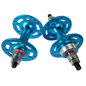Two blue bicycle hubs on a white background