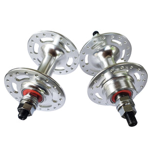 Two bicycle hubs on a white background