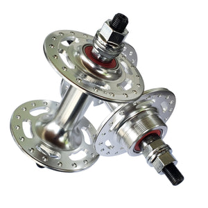 Bicycle hub on a white sheet of paper with a wooden surface background