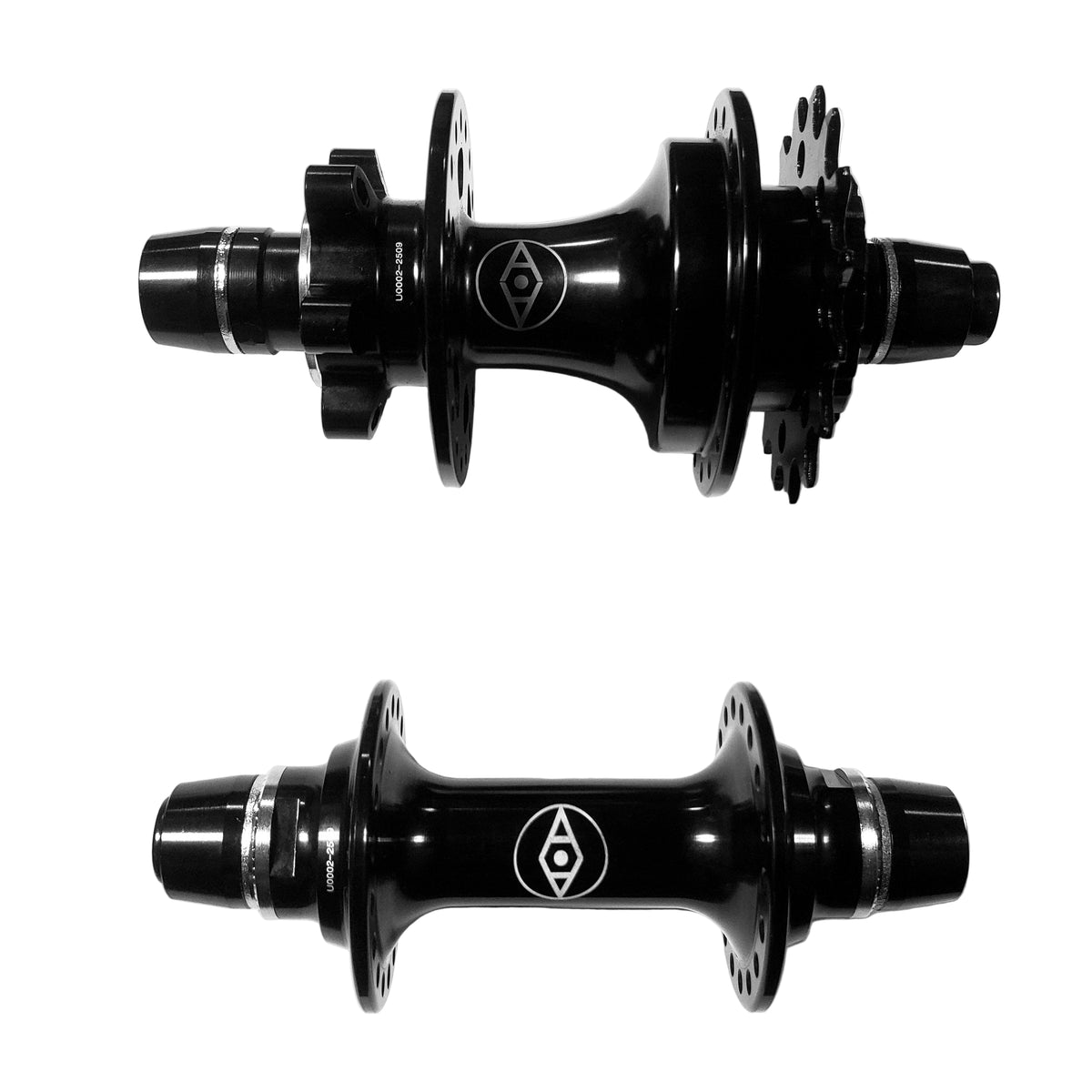 Two black bicycle hubs on a white background