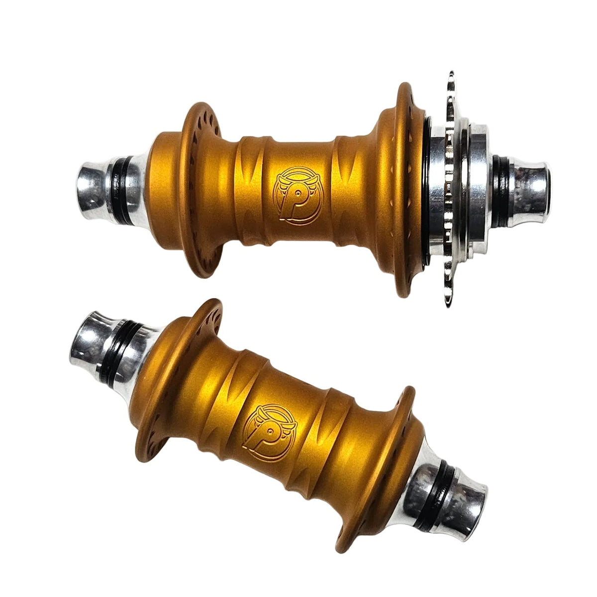 Two gold bicycle hubs on a white background