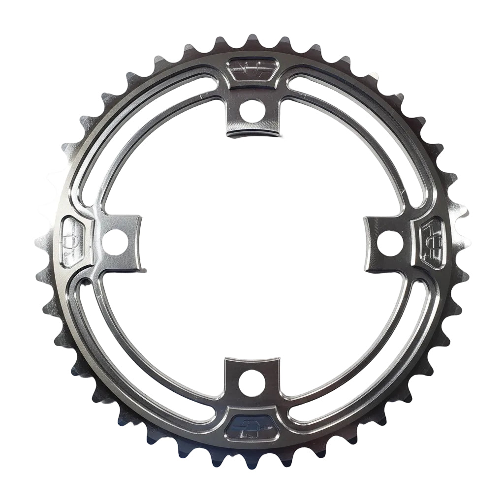 Chrome bicycle chainring on a white background