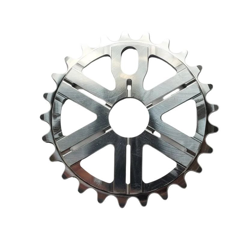 Metallic gear-like object on a white background