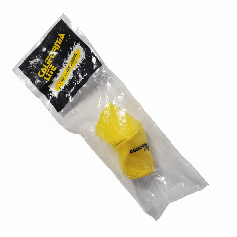 Yellow bottle with black label in clear packaging on a white background