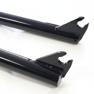 Two black metal brackets on a white background