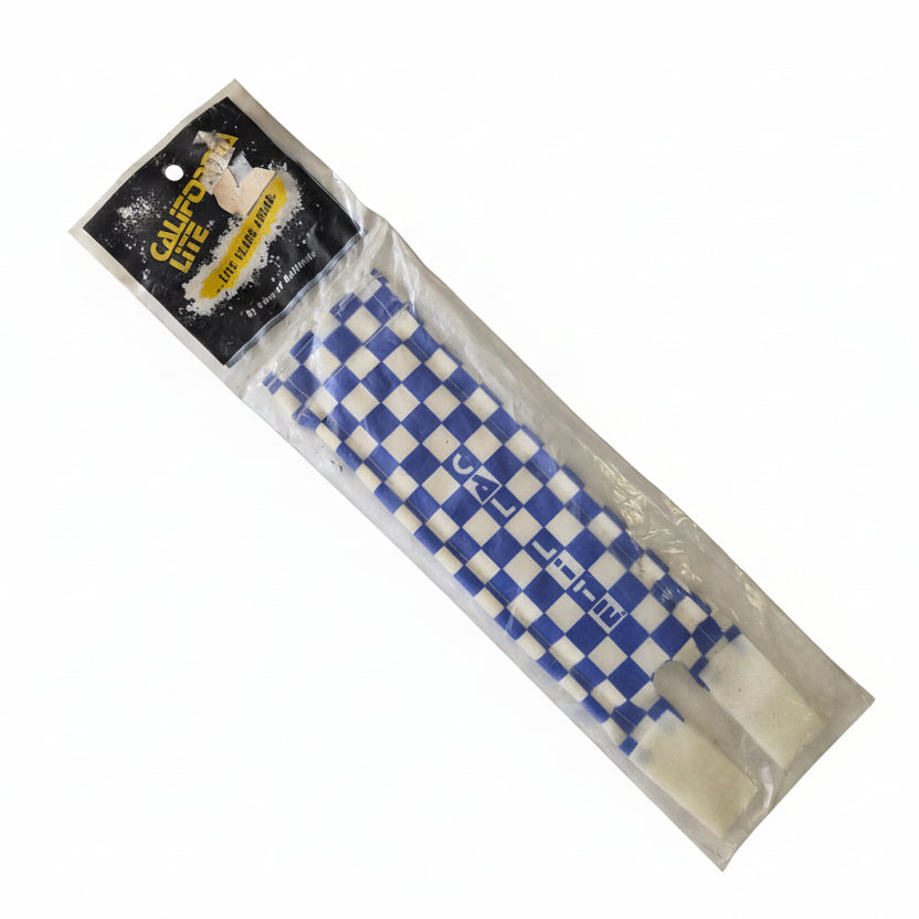 Blue and white checkered product in packaging on a light gray background