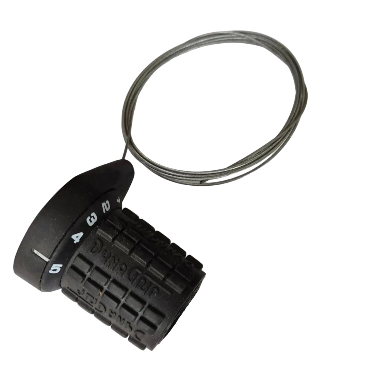 Black knob with a glass on a white sheet of paper