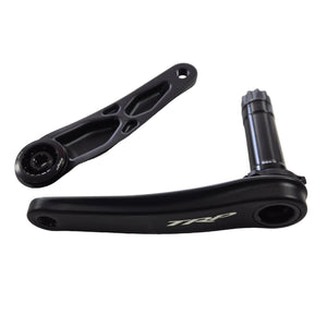 Black bicycle crankset on a light gray background