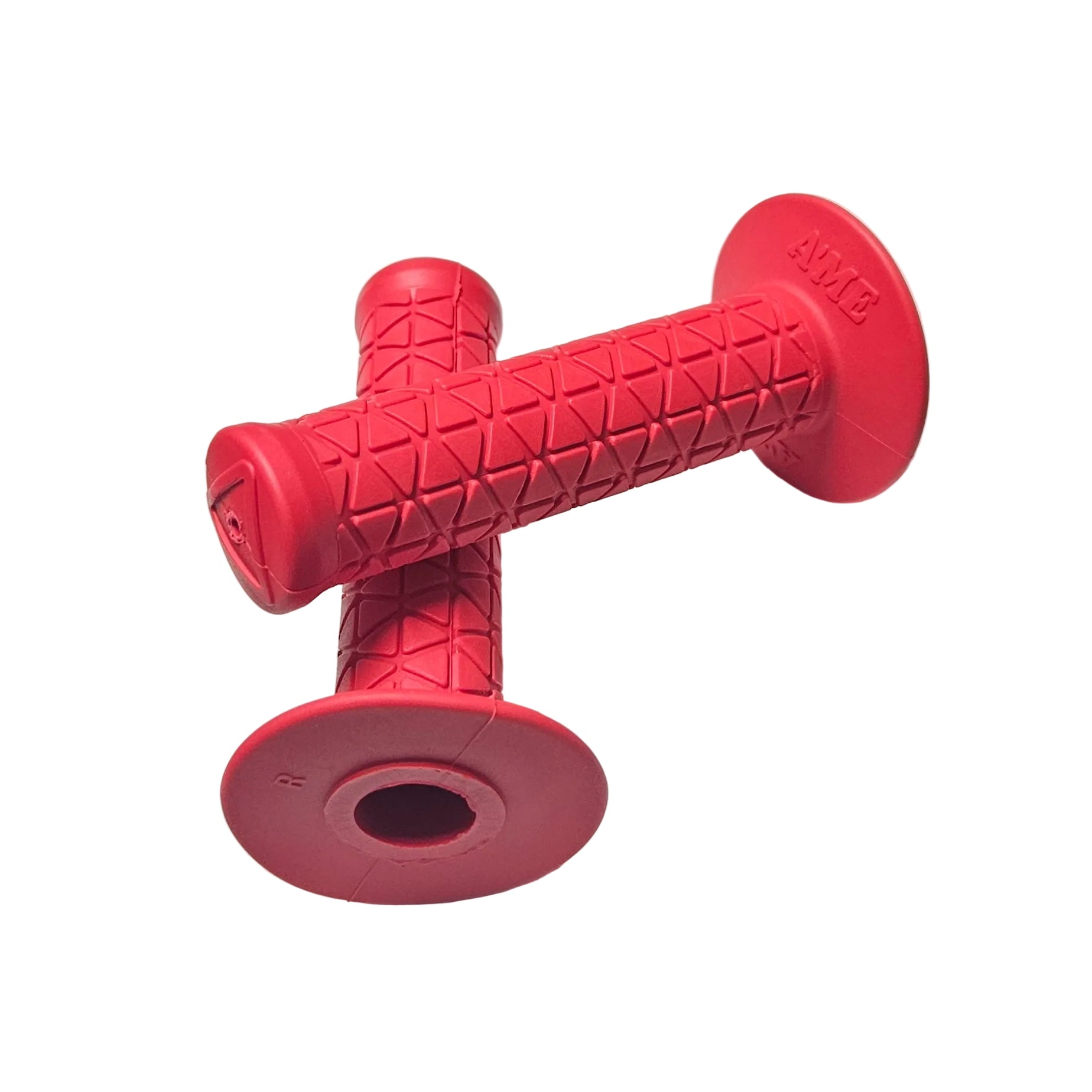 Red bicycle grips on a white surface