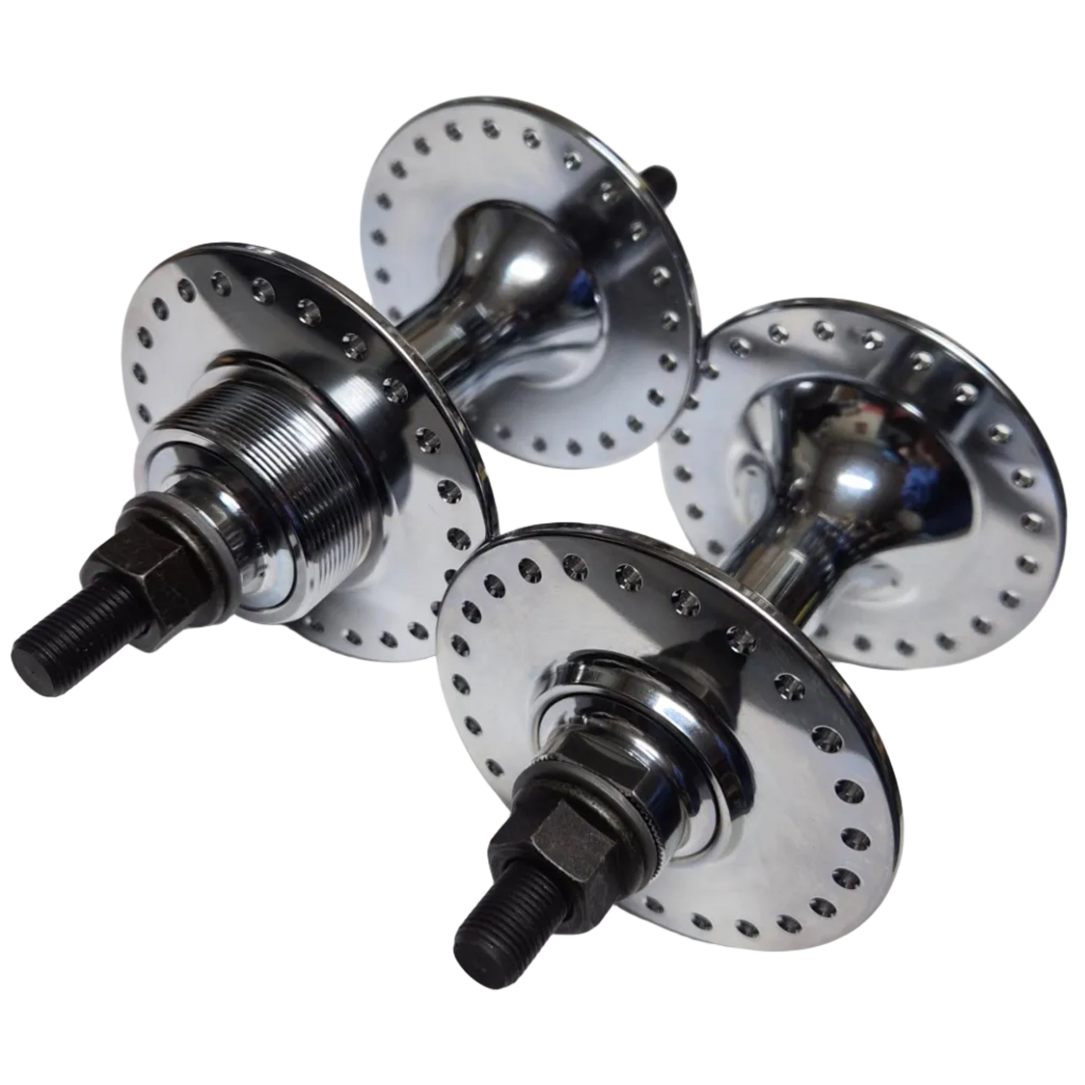 Three metallic bike hub components on a white surface
