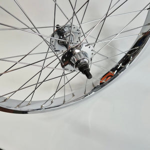 Close-up of a bicycle wheel with a white background