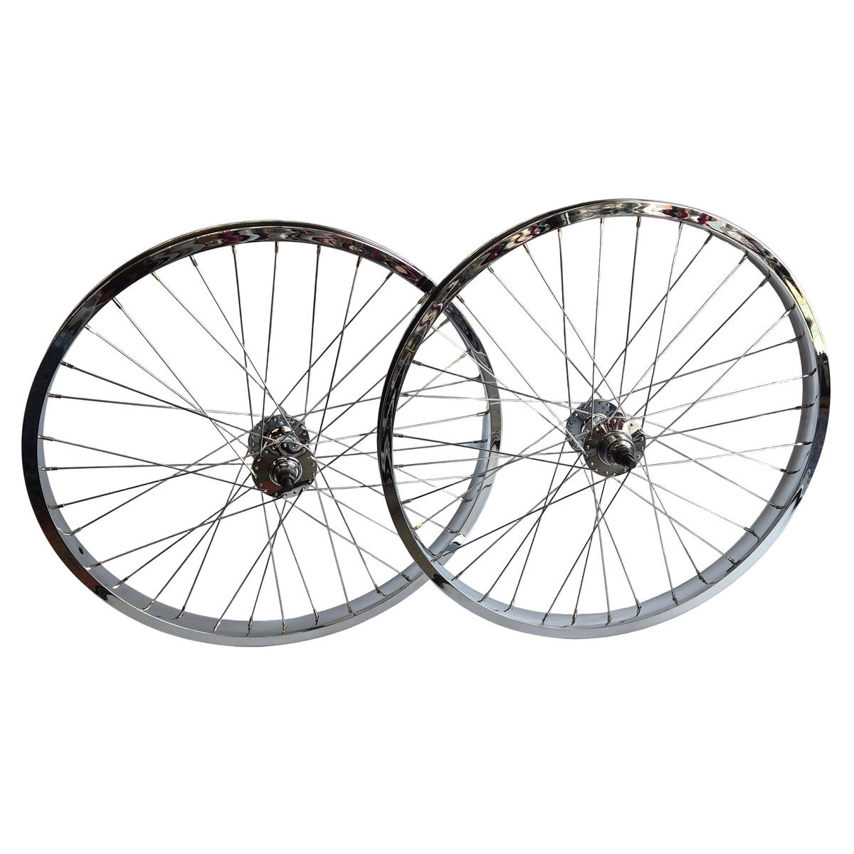 Two bicycle wheels stacked on a white background