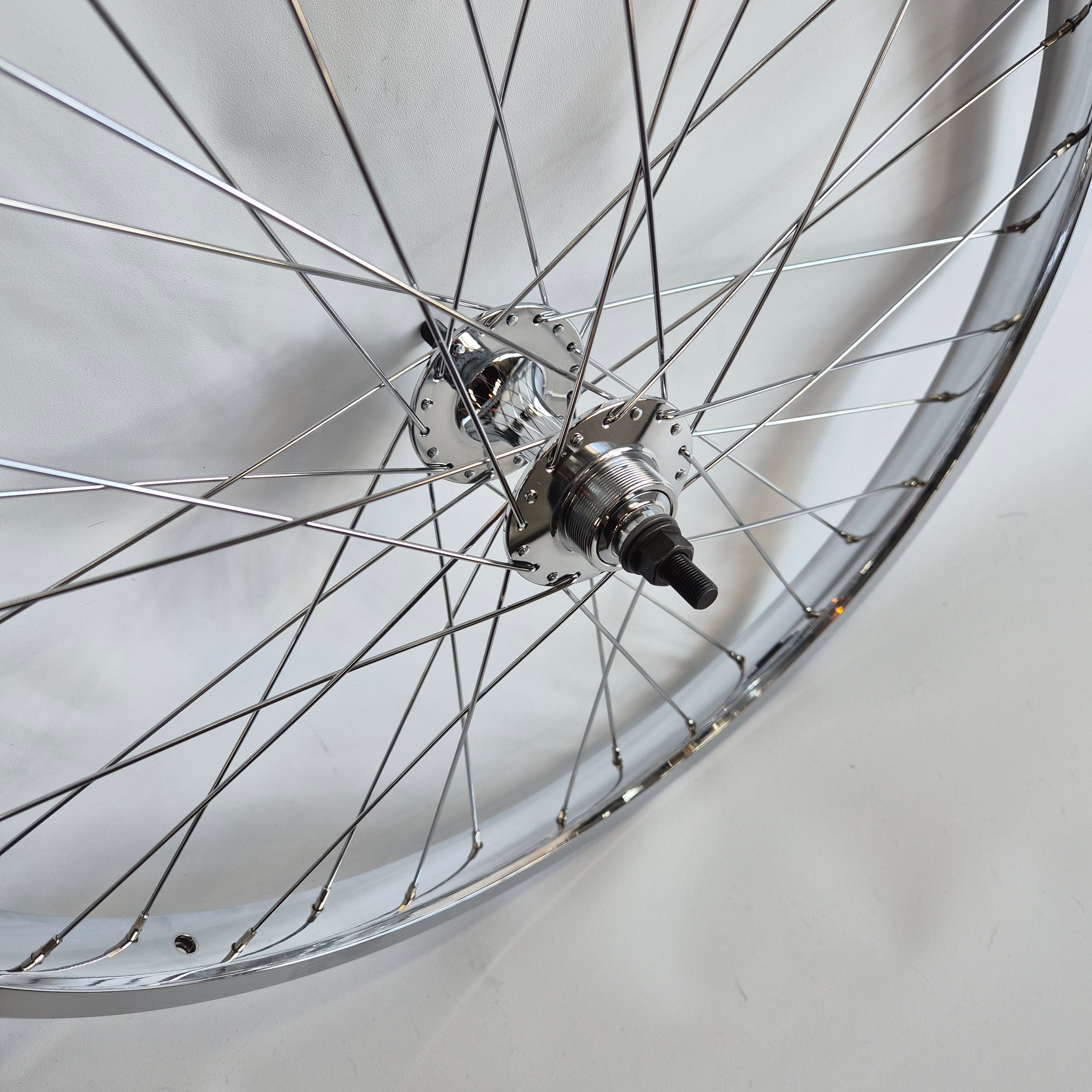 Close-up of a bicycle wheel with a white background