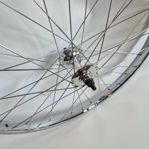 Close-up of a bicycle wheel with a white background