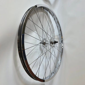 Bicycle wheel with chrome rim on a white background