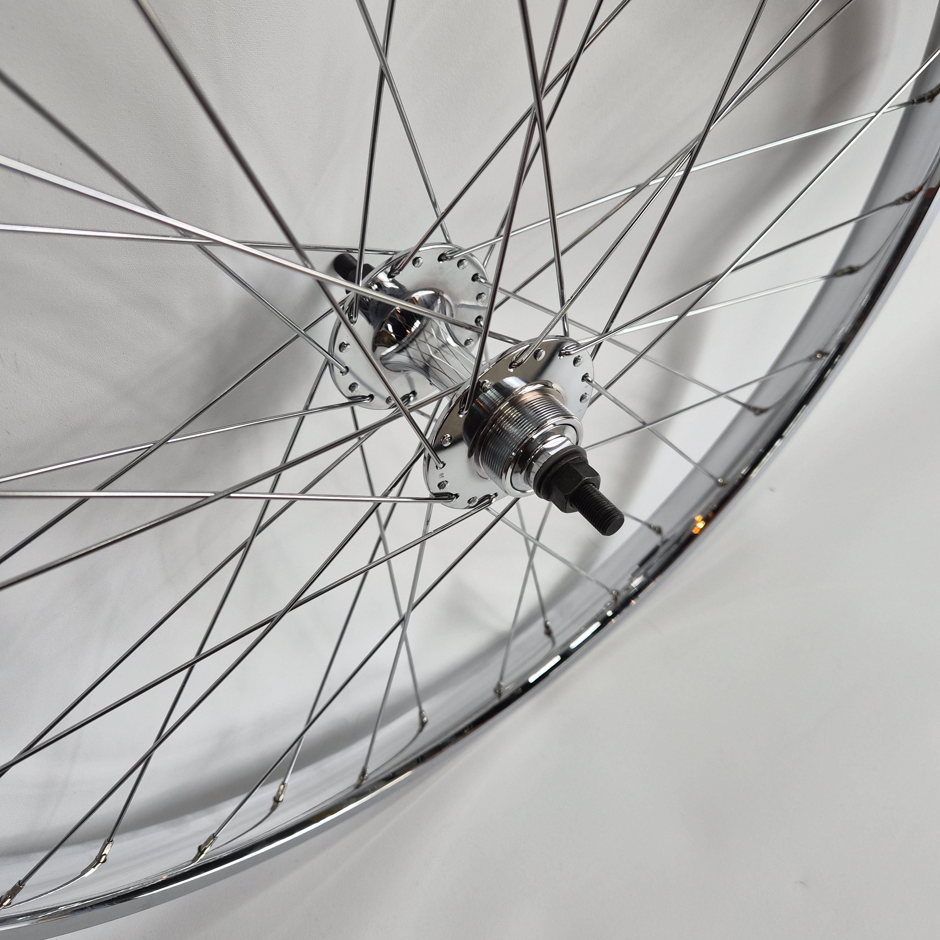 Close-up of a bicycle wheel with a white background