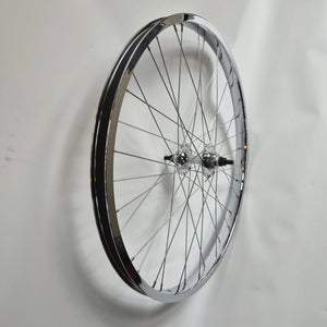 Bicycle wheel with chrome rim on a white background