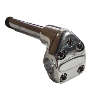 Metallic handle on a white surface with a blurred background