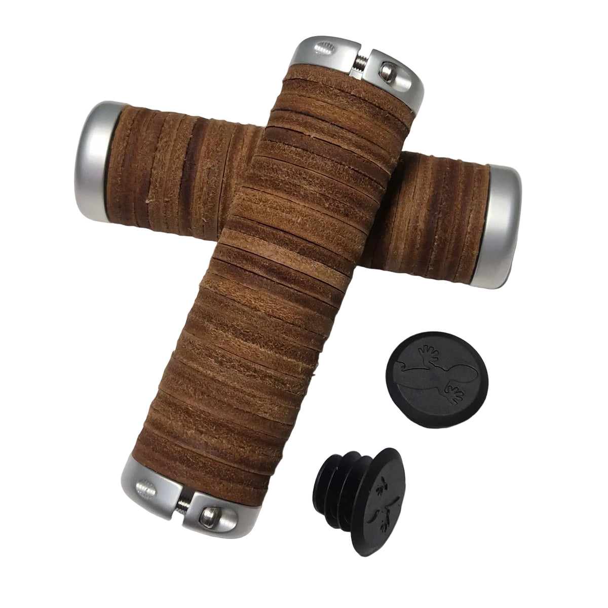 Two brown leather bicycle handlebar grips with silver metal end caps, shown crossed over each other on a white background, with two black rubber grommet caps placed below.