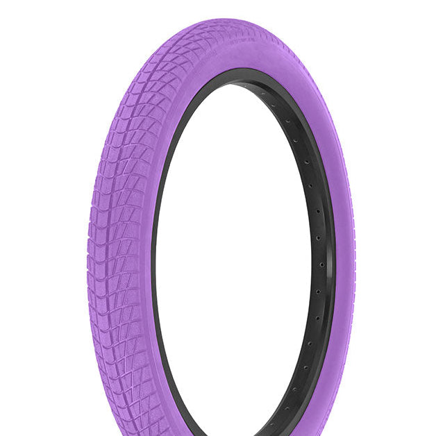 Purple tire with black wall on a white background