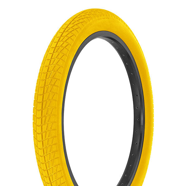 Yellow tire with black bead on a white background
