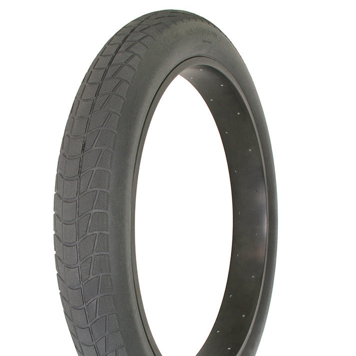 Black tire with tread pattern on a white background
