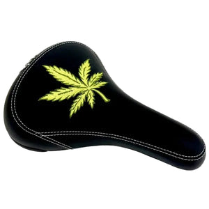 Black bicycle seat with a green leaf design on a white background