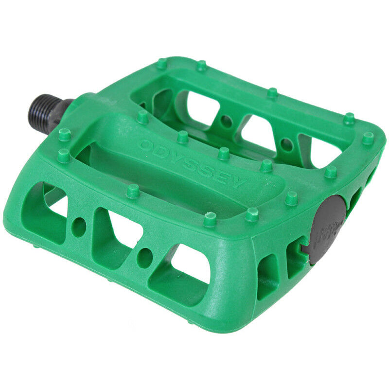 A matte Kelly green Odyssey Twisted PC BMX platform pedal with a chromoly spindle.