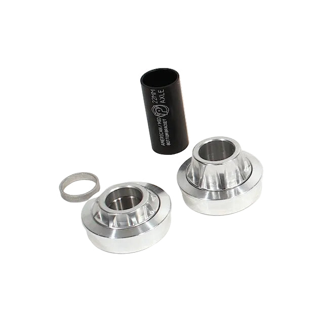 Metal hub bearing components on a white background