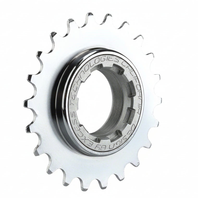 Metallic sprocket with engraved text on a white background