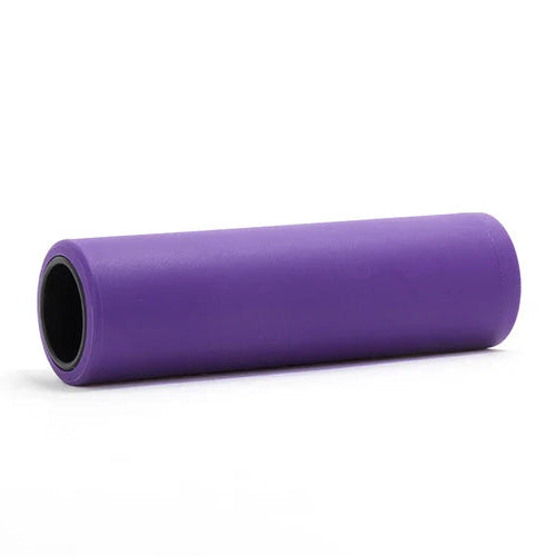 Purple foam roller on a white background
