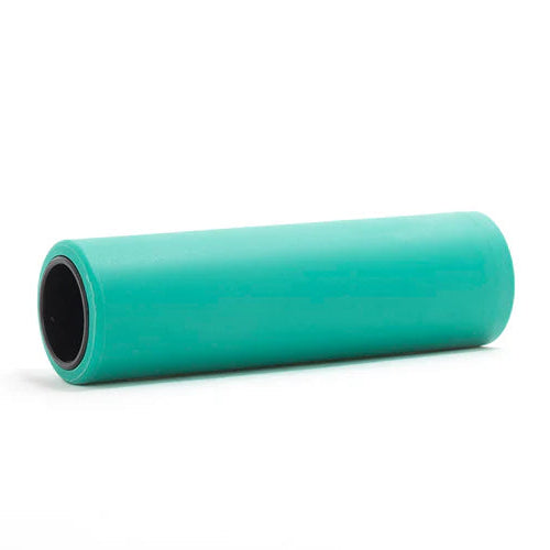 Green foam roller on a white background