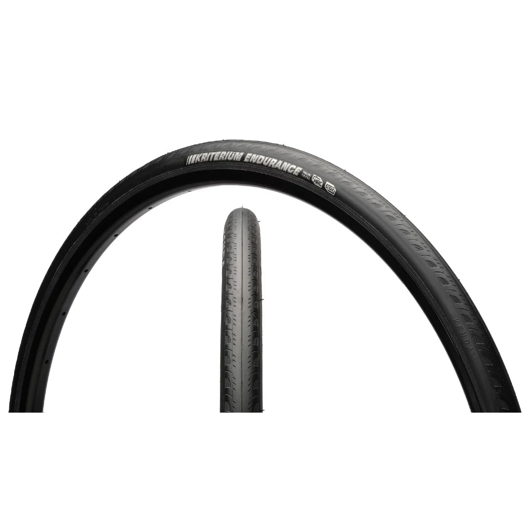 A black bicycle tire shown in a curved arch view with a smaller vertical side-profile view in the center, on a plain white background. The sidewall reads 'MICHTENON ENDURANCE'.