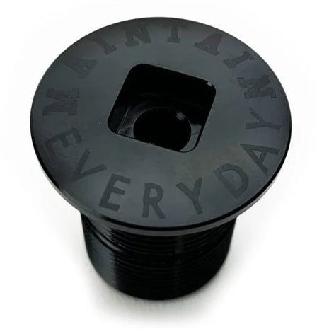 A black Cult Sect BMX Alloy Top Cap - Fork Compression Bolt etched with the words 'MAINTAIN. EVERYDAY'.