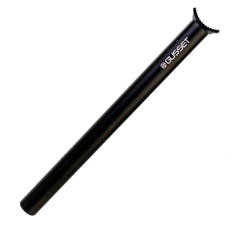 Black bicycle seat post with 'Gusset' branding on a white background