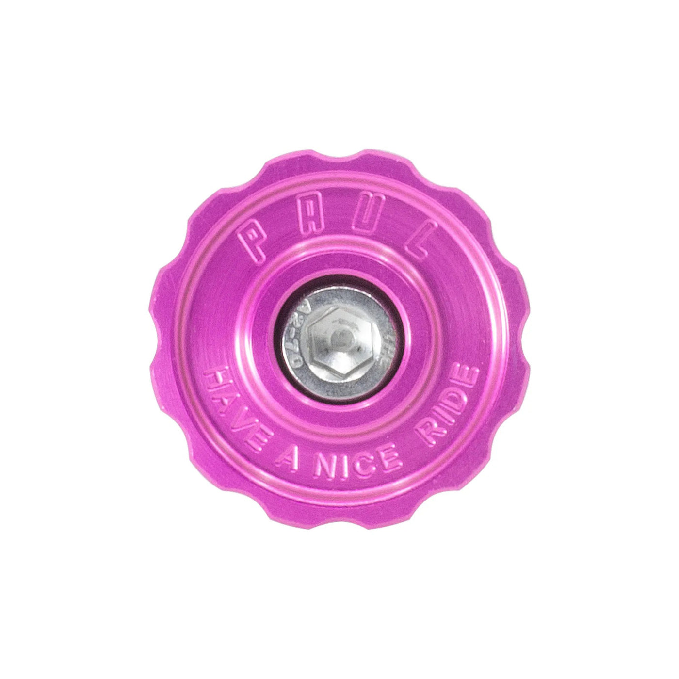 A pink anodized aluminum top cap for a bicycle stem with a stainless bolt in the center, featuring the brand name 'Paul'.