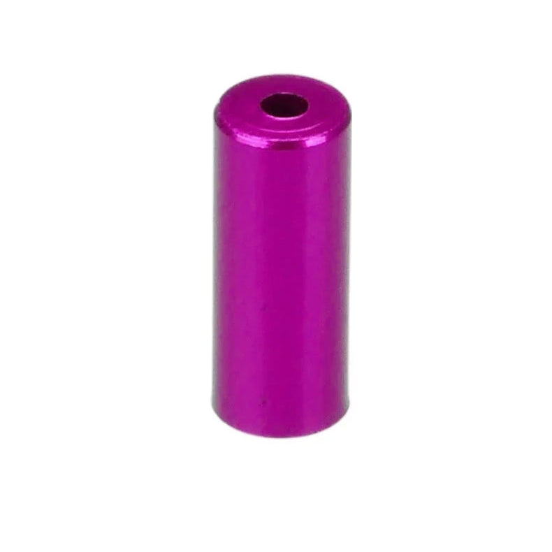 Purple cylindrical metal object on a white background