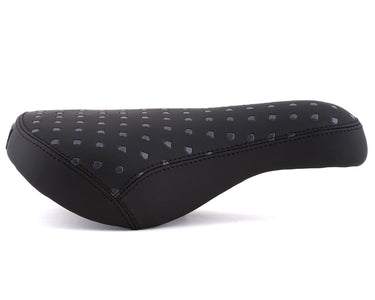 Black bicycle seat with diamond pattern on a white background