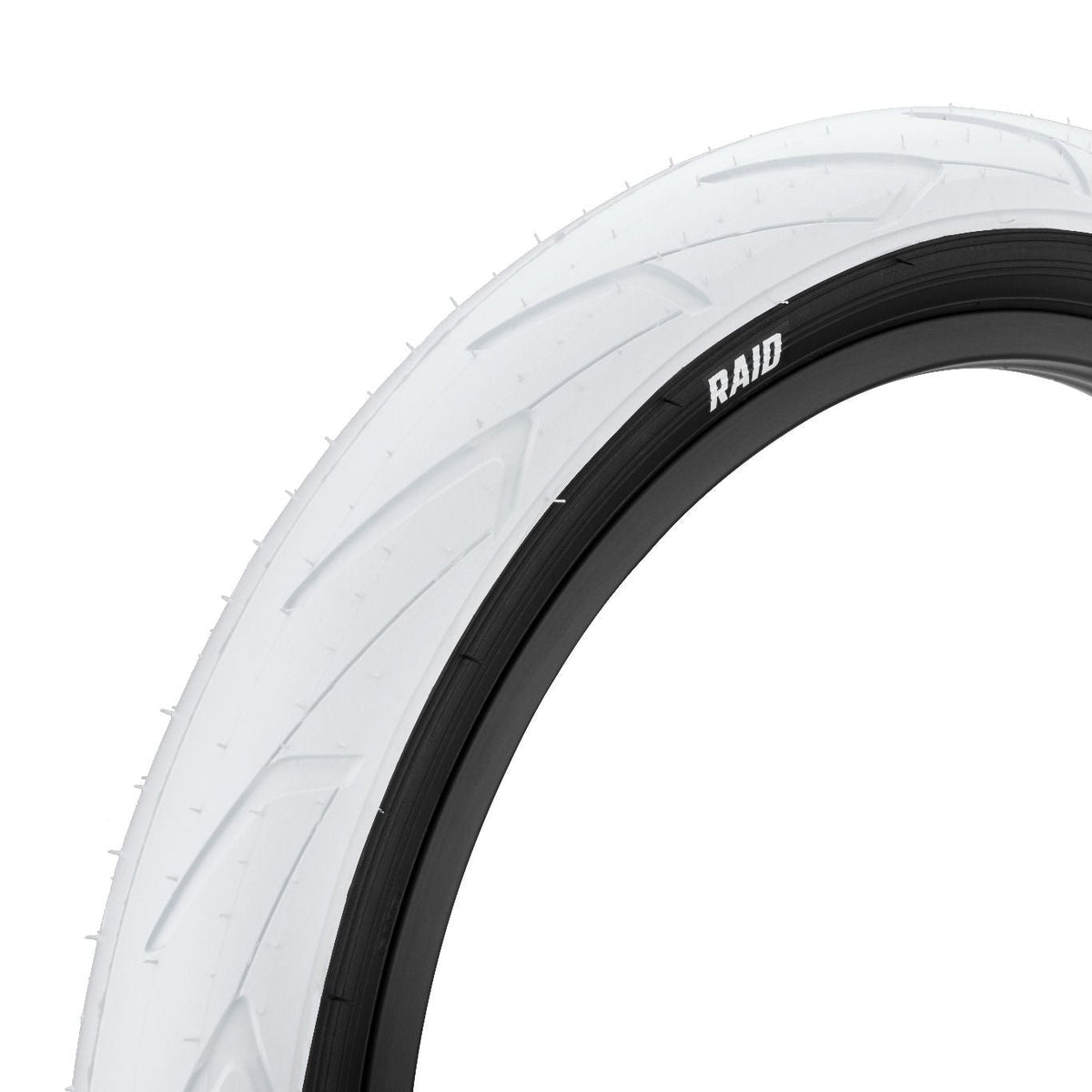A close-up studio shot of a white bicycle tire with a black inner tube or rim edge, showing the tread pattern and the visible brand name RAID on the sidewall, against a plain white background.