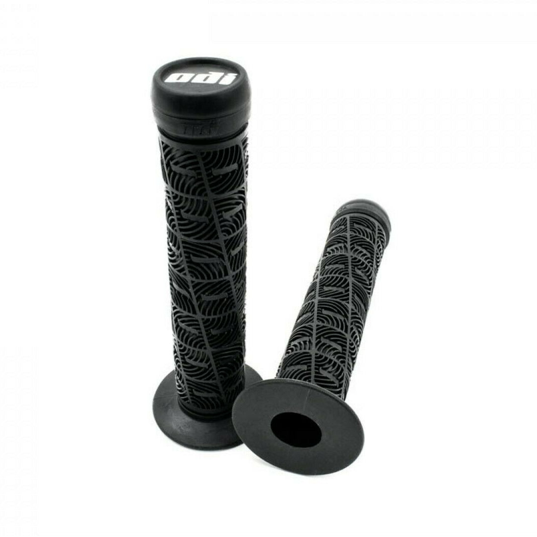 A pair of black ODI 'O' BMX grips with flanges and push-in type caps, displayed against a white background.