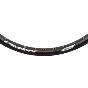 A black 20-inch Sun Ringle Envy rear bicycle rim with machined sidewall and eyelets for spokes.