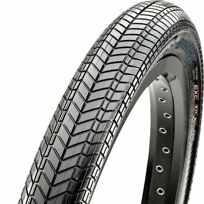 A black Maxxis Grifter BMX tire mounted on a white rim, with visible tread pattern and brand logo.