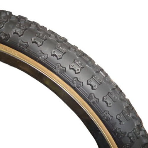A black CST Comp III BMX tire with a tan skinwall.