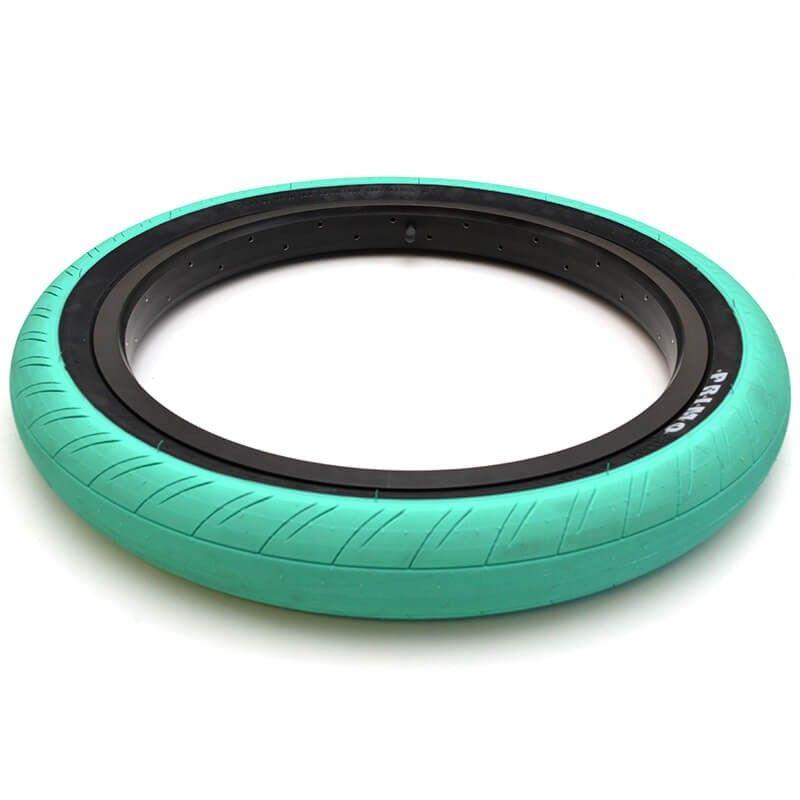 20x2.45 Primo Churchill BMX Tire in teal color with black sidewall, featuring a knurled tread pattern.
